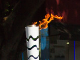 На очередном этапе эстафеты олимпийского огня в Бразилии неизвестный мужчина намеревался напасть на факелоносца