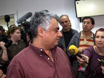  ,   Haaretz 
